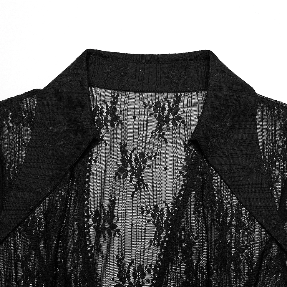 Close-up detail of black gothic cape collar, showing notched lapel and mesh lace construction