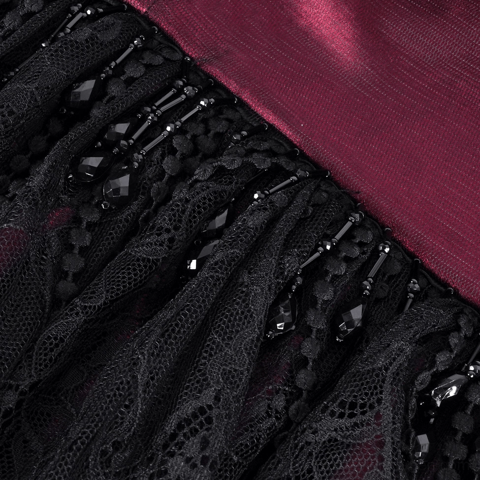 Close-up of gothic cape beaded lace trim featuring faceted black crystal dangling accents with intricate lace detailing