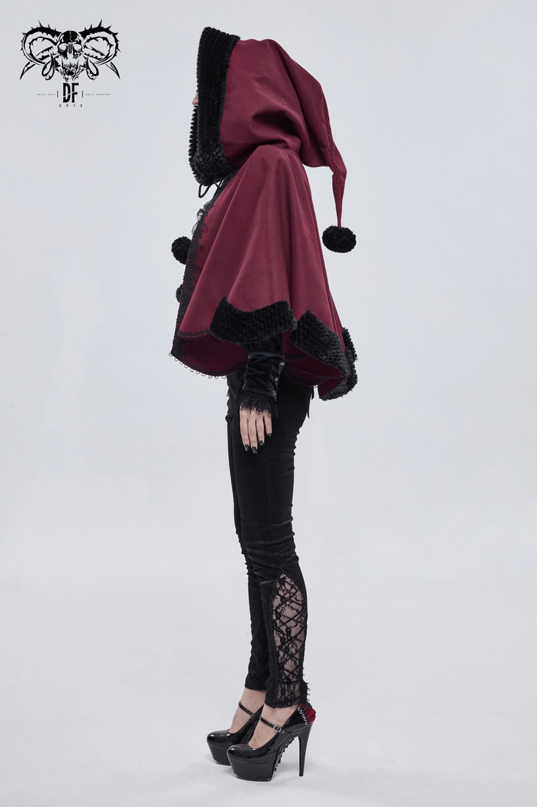 Red gothic hooded cape close-up showing embroidered lace hem and black fur accents
