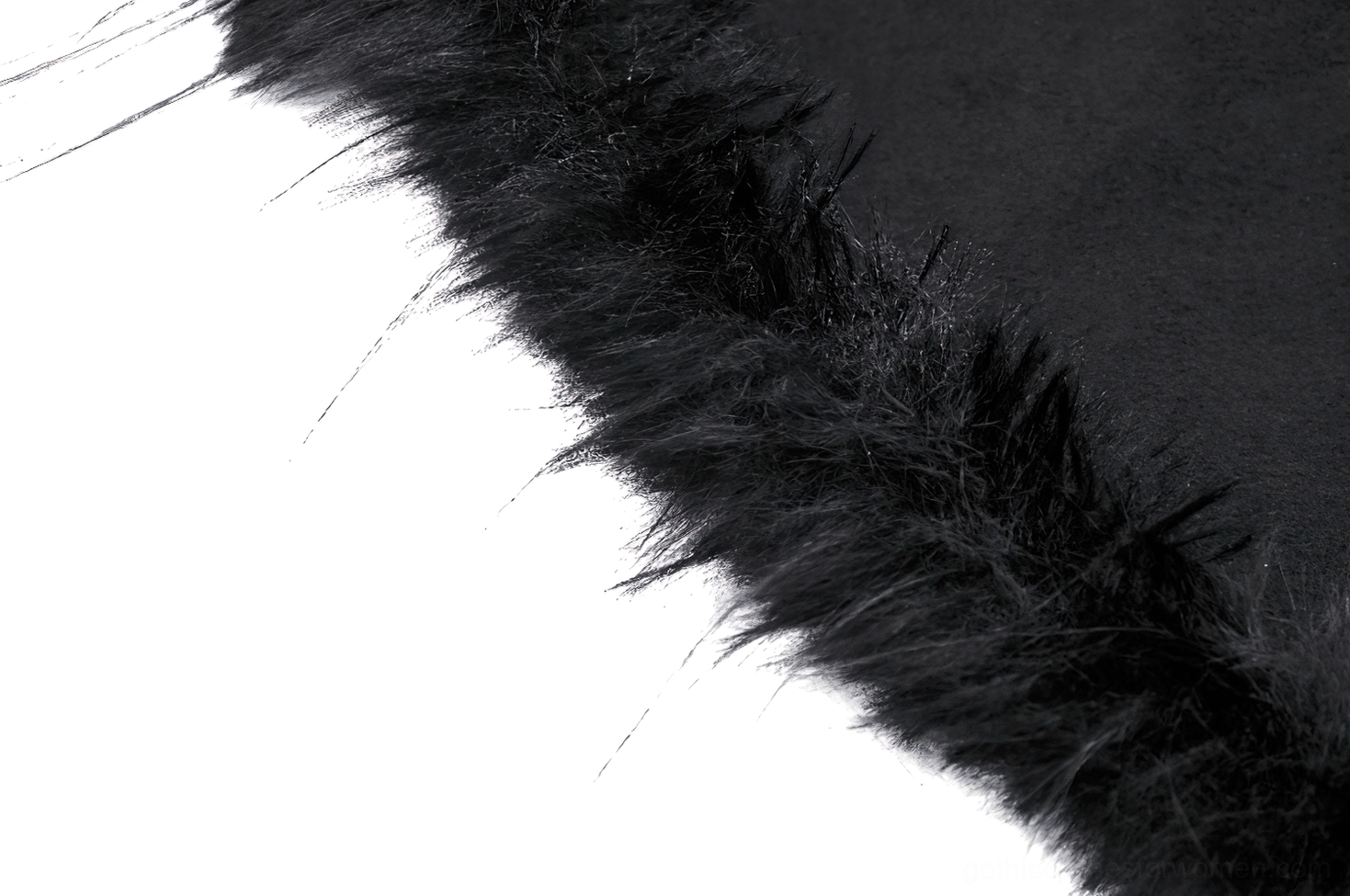 Detailed view of faux fur fabric bonding on gothic cape showing construction quality