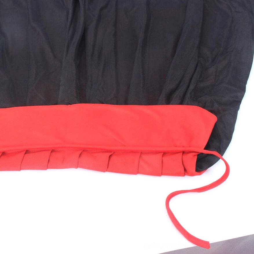 Gothic vampire cape hem detail with pleated edge and red drawstring accent