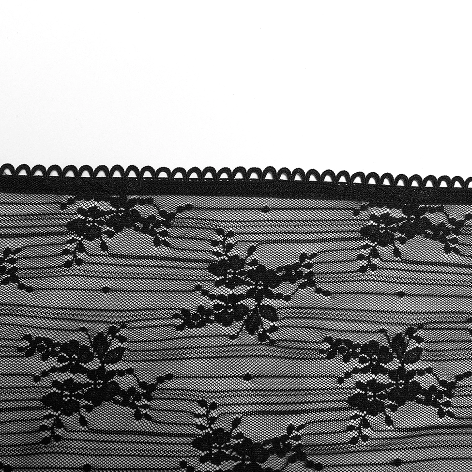 Black sheer lace gothic cape fabric texture and floral lace pattern close-up detail