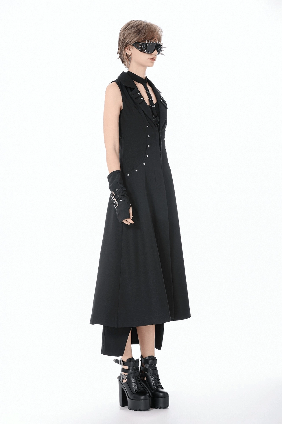 Gothic open front cape styling - draped full-length black coat with silver stud accents worn on model
