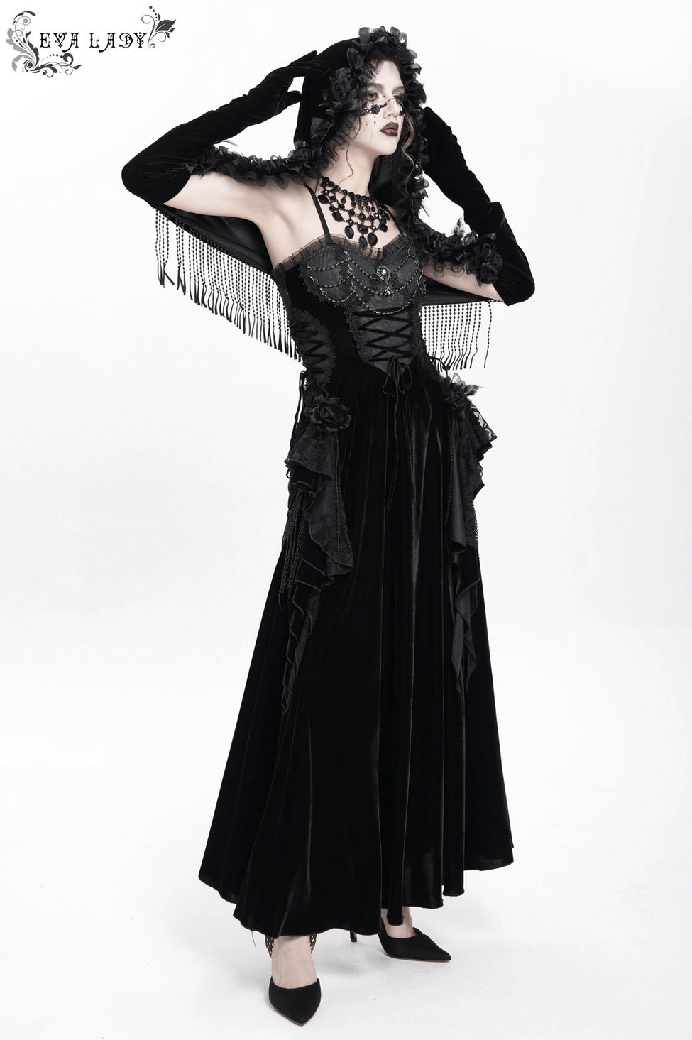 Black velvet hooded gothic cape with intricate rose and lace embellishment on hood, theatrical beaded fringe hemline
