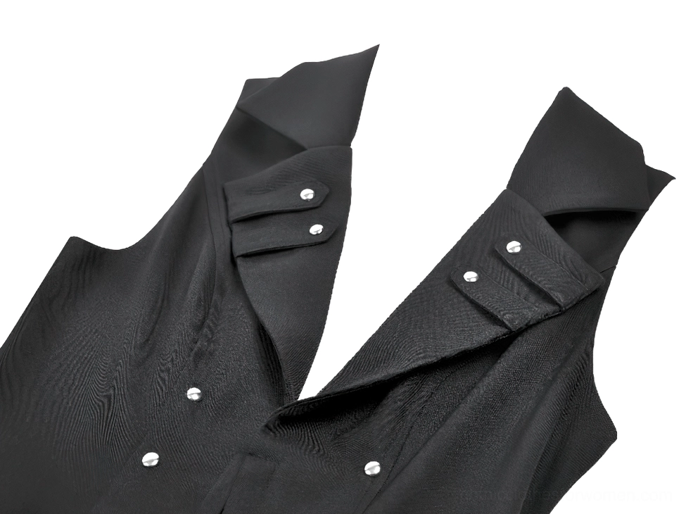 Gothic cape shoulder strap detail - silver stud buttons and adjustable fabric closure mechanism close-up