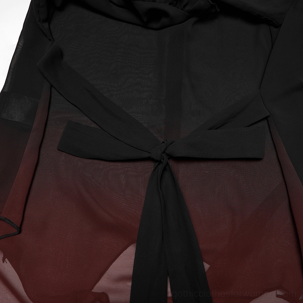 Close-up detail of adjustable self-tied fabric bow waist sash on ombre chiffon gothic cape