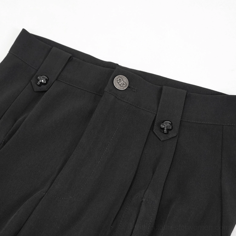 Waistband detail of black gothic cargo joggers featuring button fly closure tailored pleats and skull-themed metal buttons