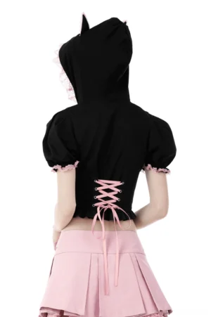 Black gothic crop top with lace-up corset back and pink lace cuffs - back view on model