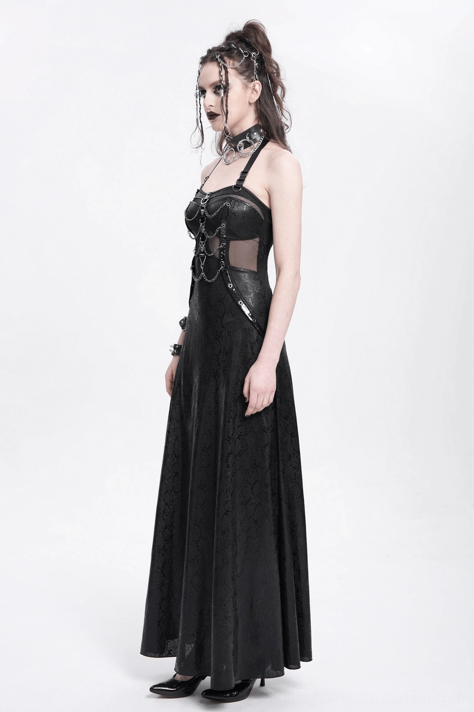 Detailed view of black gothic chain maxi dress construction showing mesh cutouts and corset lacing technique
