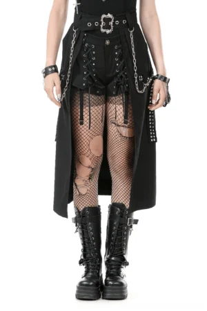 Black gothic A-line skirt with chain details and metal buckle belt worn by model, front view
