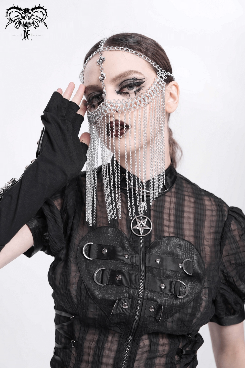 Gothic chain face veil headpiece demonstrating adjustable fit and cascading chain design on model