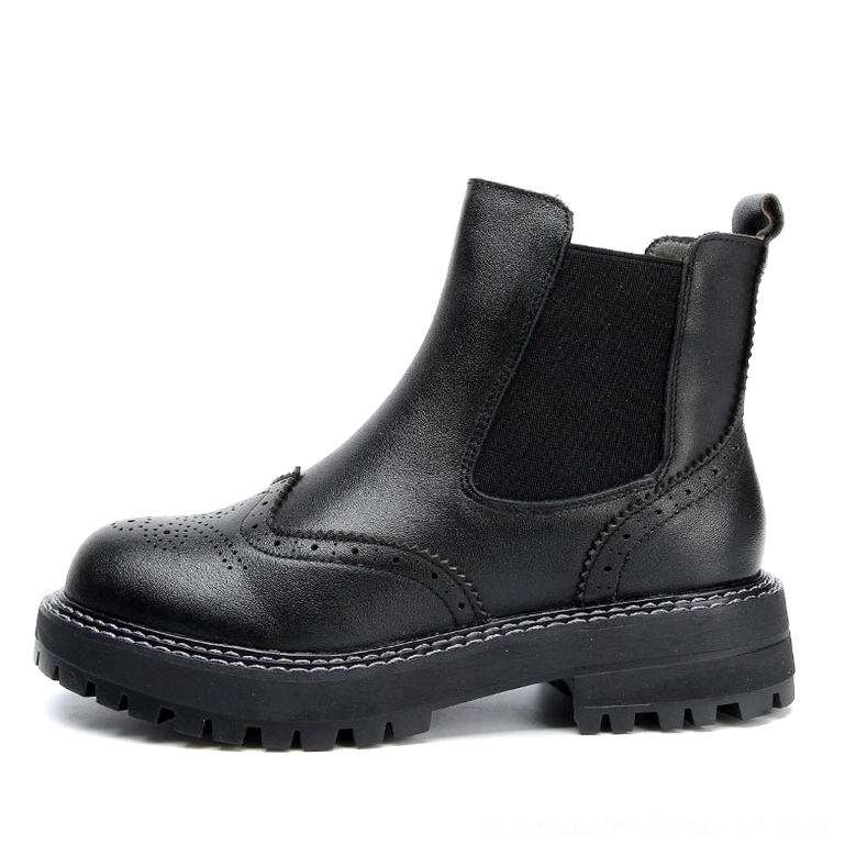 Dark gothic Chelsea ankle boots with elastic side panels and chunky lug sole - side view