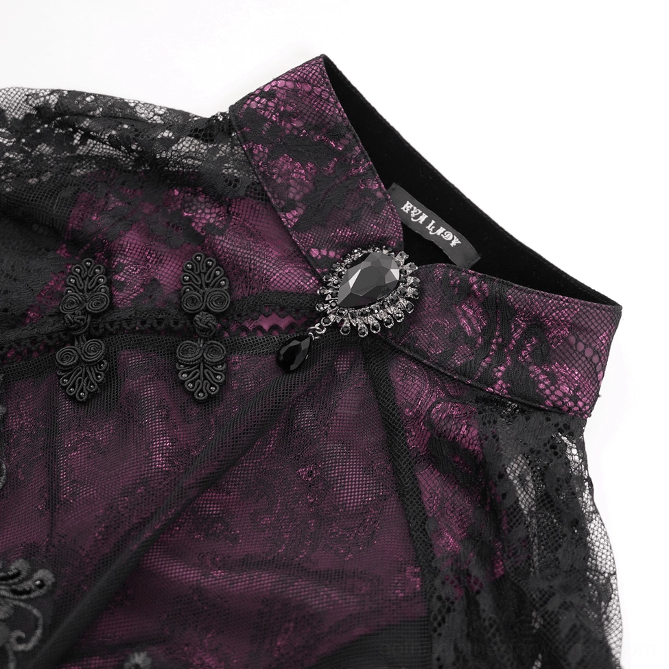 Close-up of gothic cheongsam dress high collar detail with jeweled brooch and Chinese frog buttons