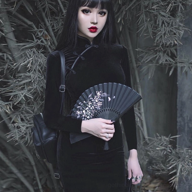 Black velvet gothic cheongsam dress model outdoor scene with bamboo forest background