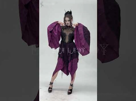 Model wearing gothic lace cheongsam dress with asymmetric hem, full front pose with sheer lace bodice
