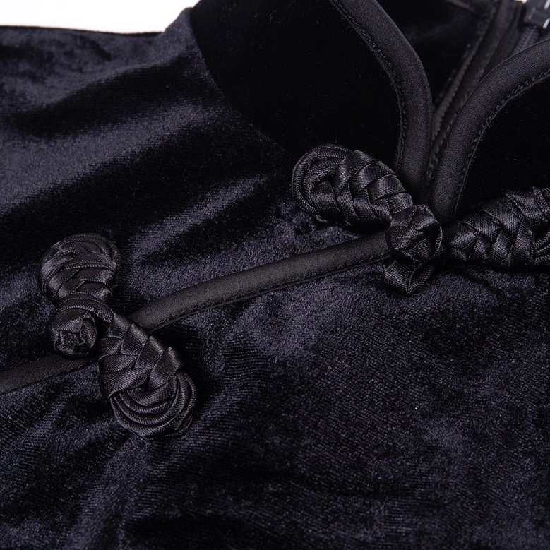 Black velvet gothic cheongsam dress paired with leather handbag and accessories
