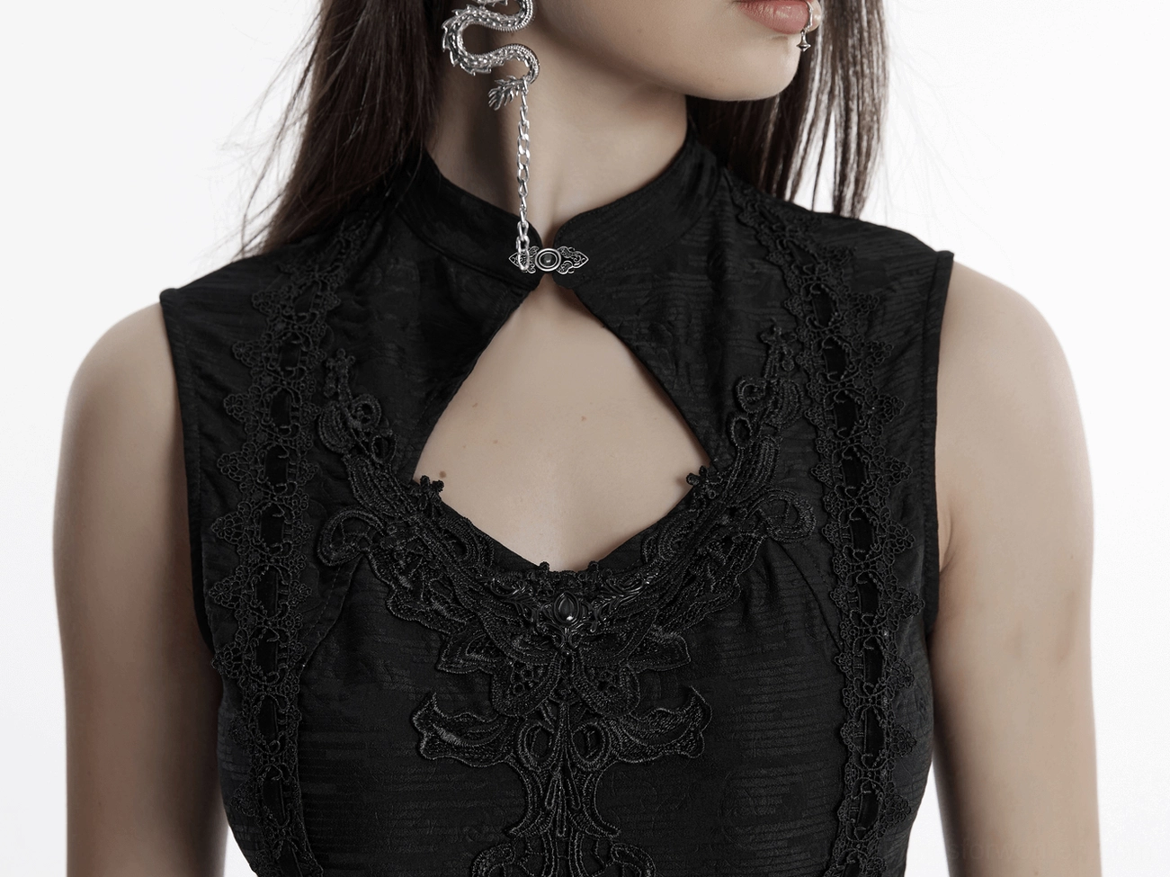 Gothic sleeveless cheongsam dress showing lace panel and jacquard texture close-up