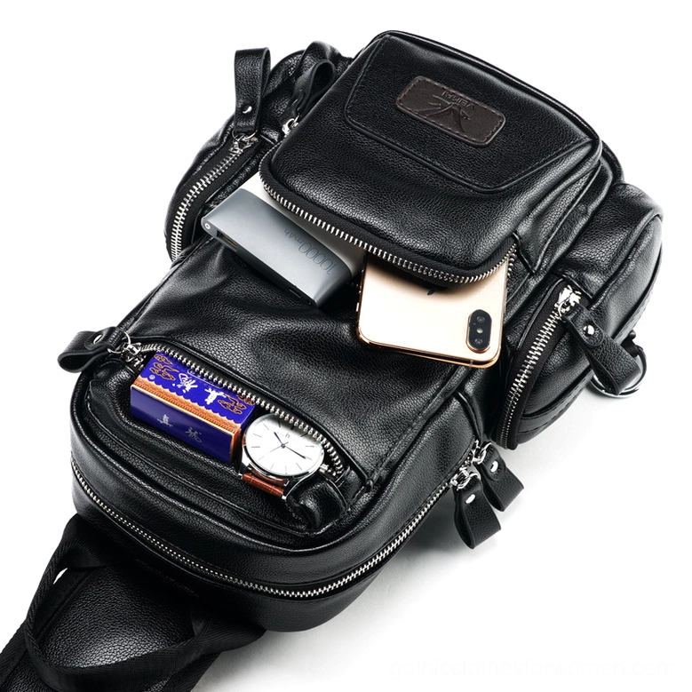 Open gothic chest bag showing accessible interior compartments and storage capacity for daily items