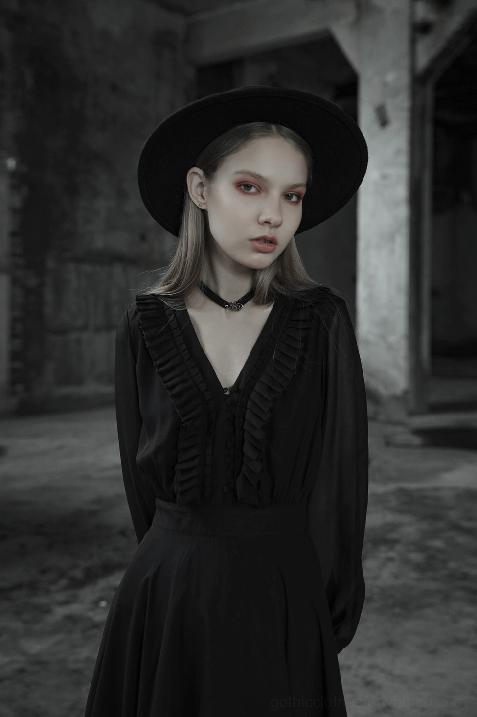 Black asymmetrical chiffon gothic dress mannequin display showcasing overall silhouette and hem asymmetry