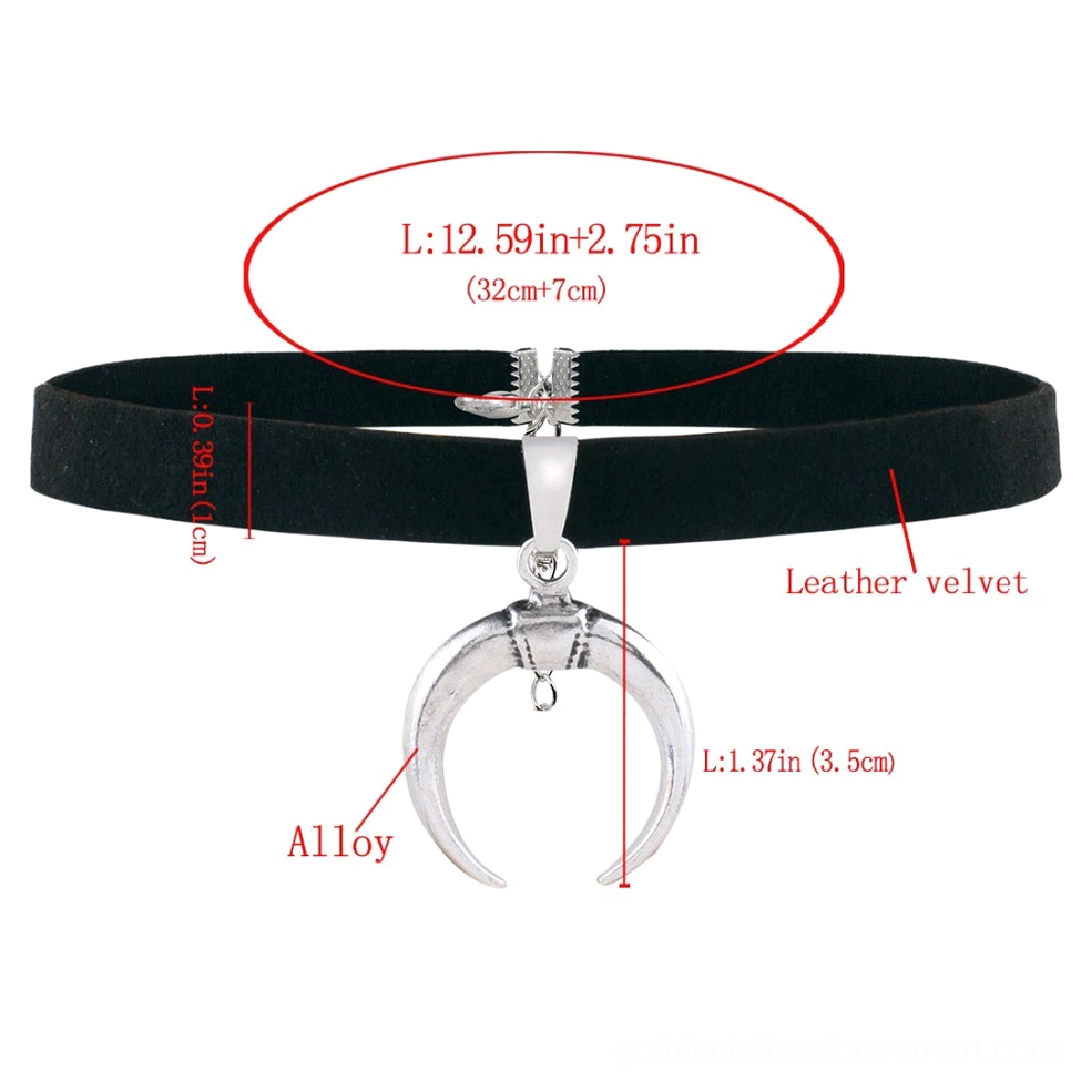 Flat lay view of black velvet crescent choker necklace showing complete composition and measurements