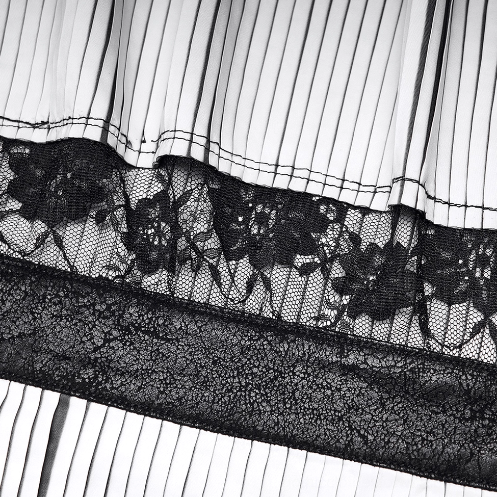 Macro detail of gothic choker crimp pleated fabric with black and white stripes and floral lace stitching