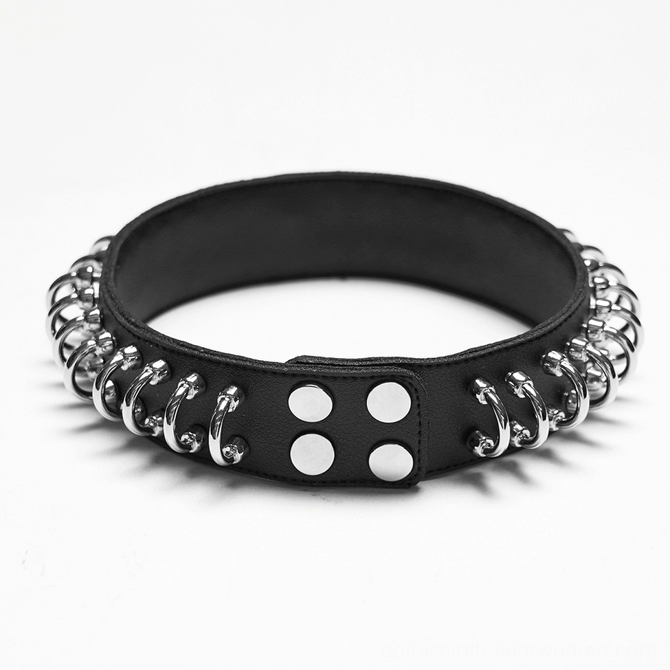 Black leather choker strap with metal hardware fasteners side view flat lay