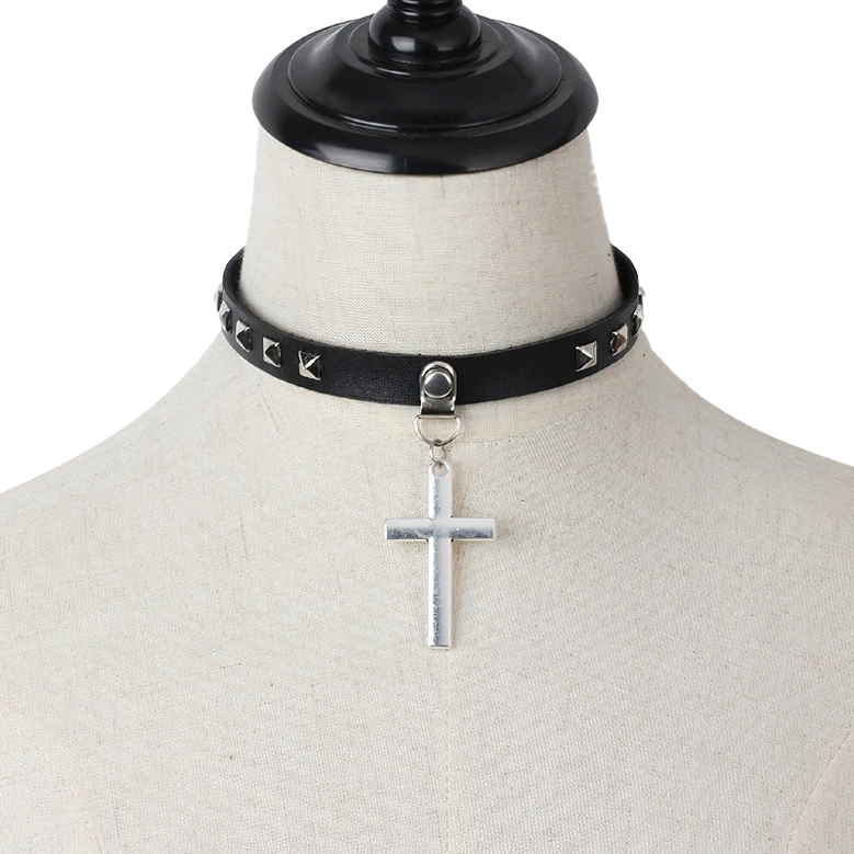 Gothic cross choker displayed on dress form mannequin - front facing view with silver studs visible