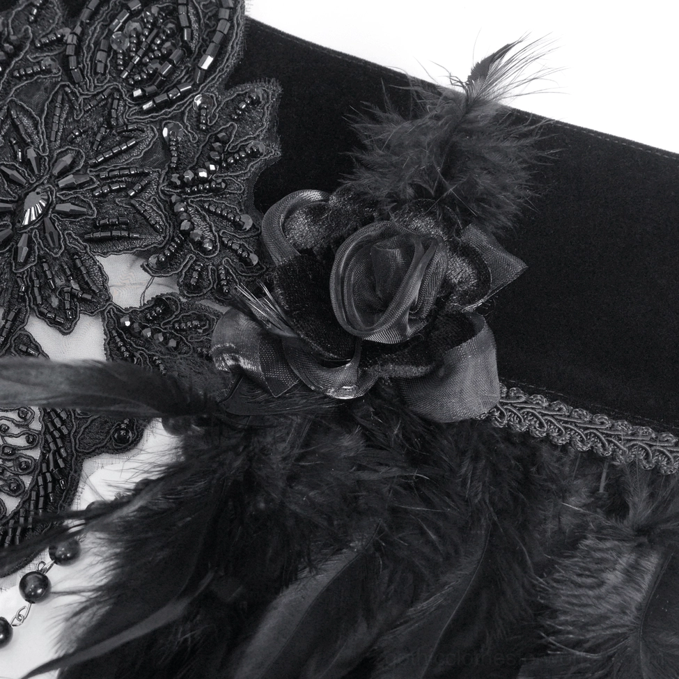 Macro close-up of gothic choker decoration featuring black fabric rose appliqué, intricate beaded lace pattern, feather accents, and soft velvet base material