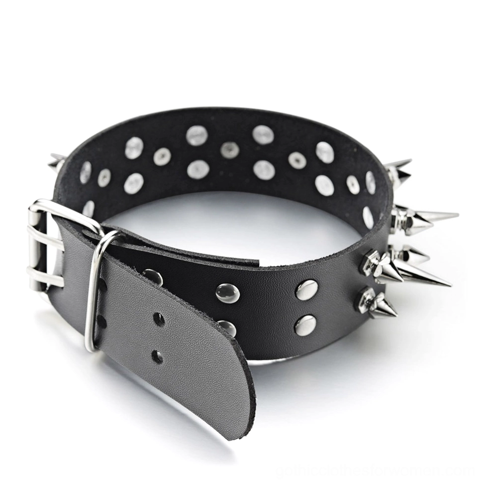 Gothic choker flat lay side view showing multiple adjustment holes, metal buckle fastener, and dense spike coverage