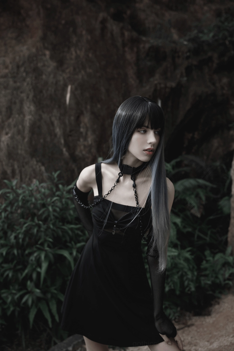 Gothic choker and detachable arm sleeves showing elastic rhombus gauze pattern with metal rivets and precision-engineered attachment points for versatile styling