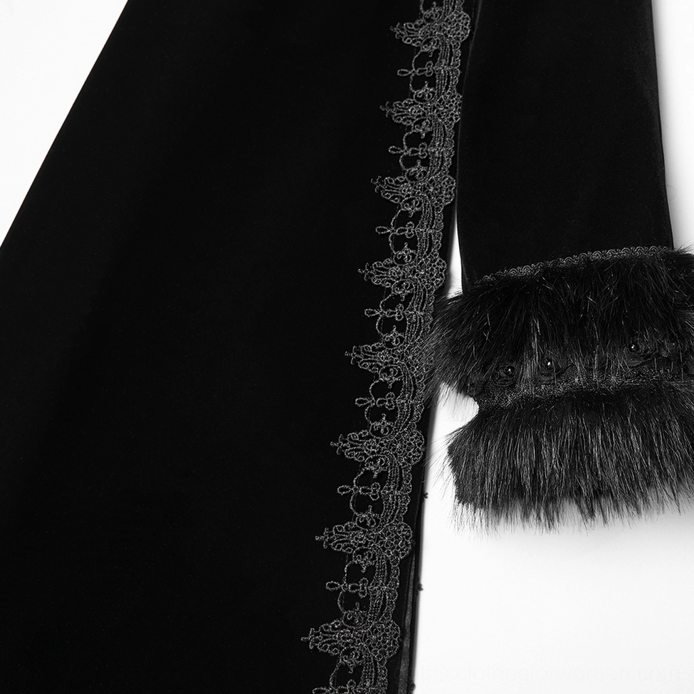 Close-up of black gothic cloak coat sleeve trim showing embroidered lace and faux fur cuff