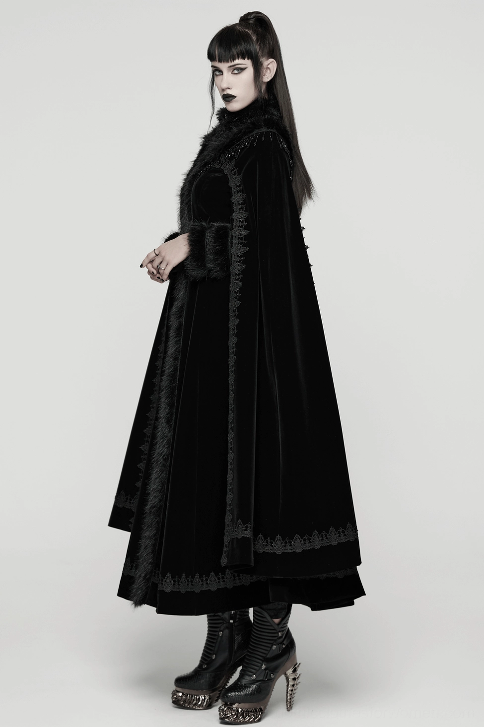 Black velvet gothic cloak coat styled with alternative fashion accessories and jewelry