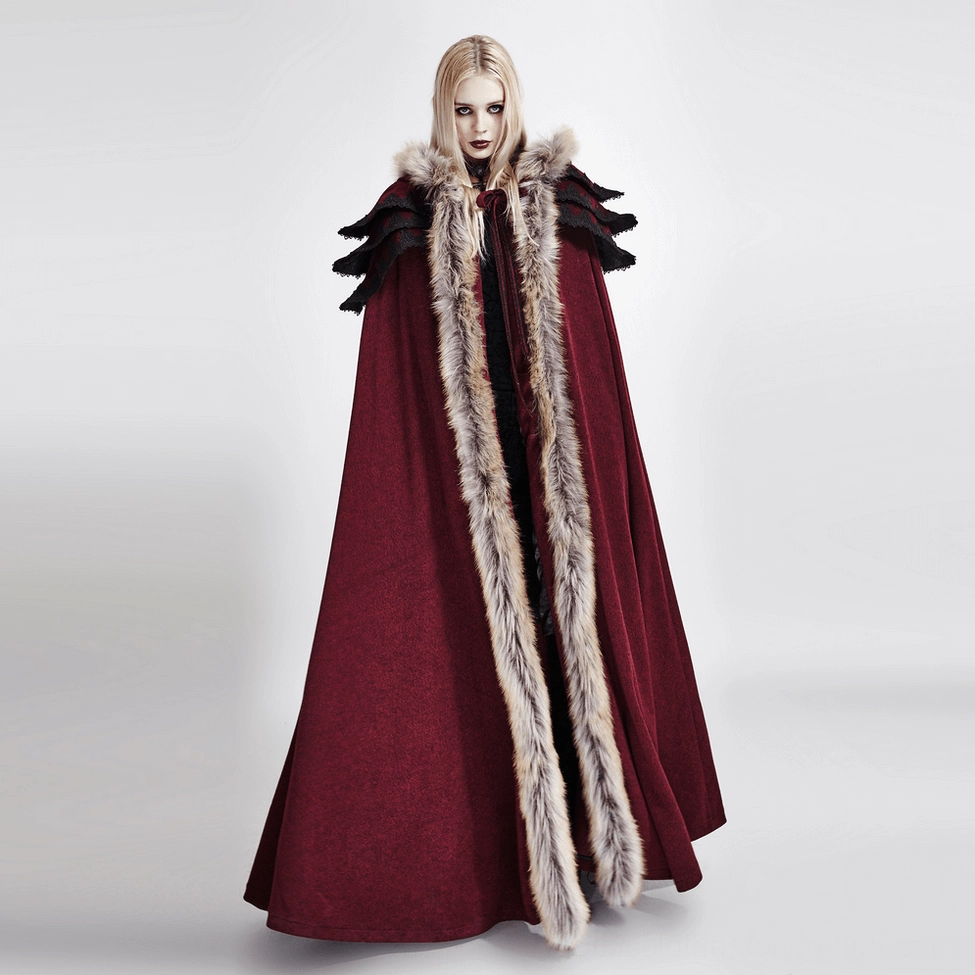 Full front view of gothic wine-red hooded cloak on model displaying faux fur trim and black ruffled shoulder pieces