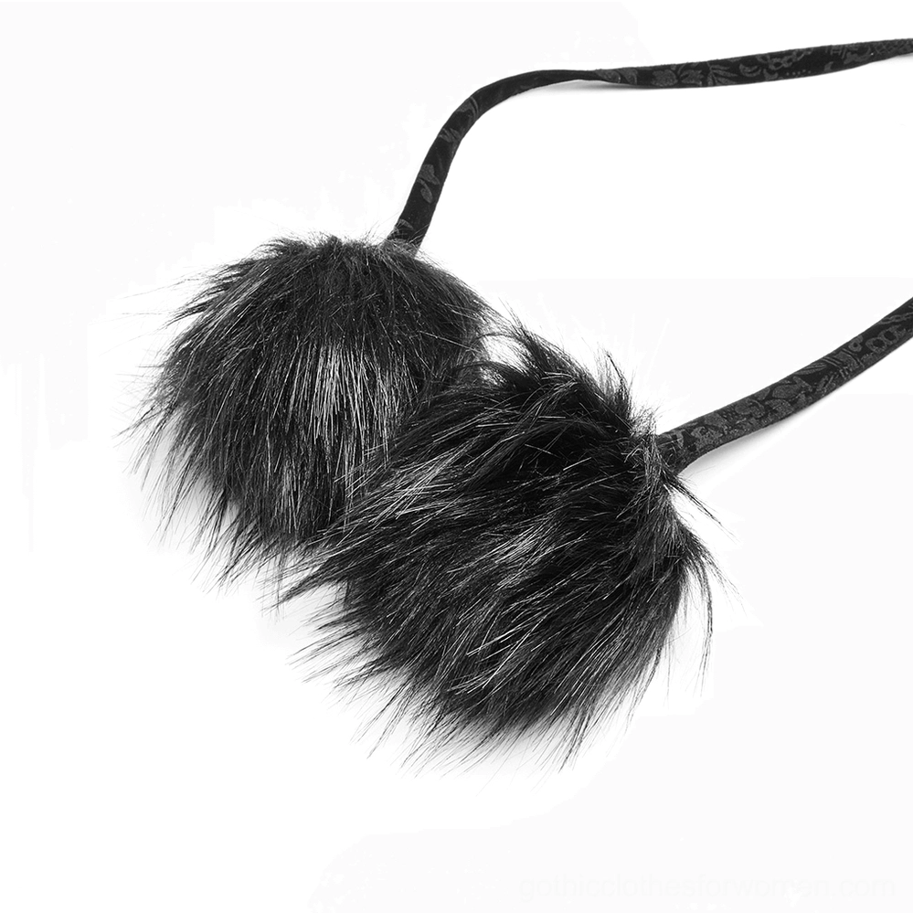 Black Gothic cloak fuzzy pom-pom closure strap close-up detail showing dual faux fur balls and woven fabric