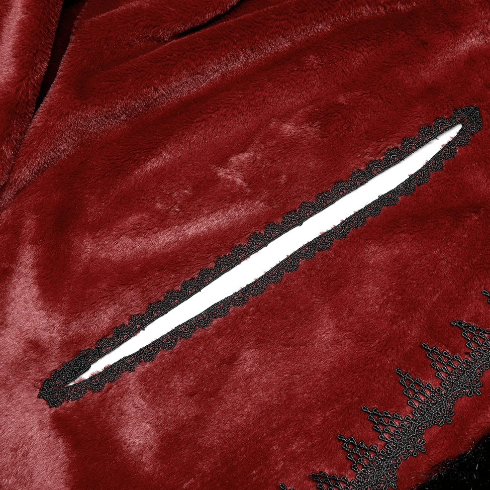 Side pocket detail of red velvet gothic cloak with delicate lace trim and stitching