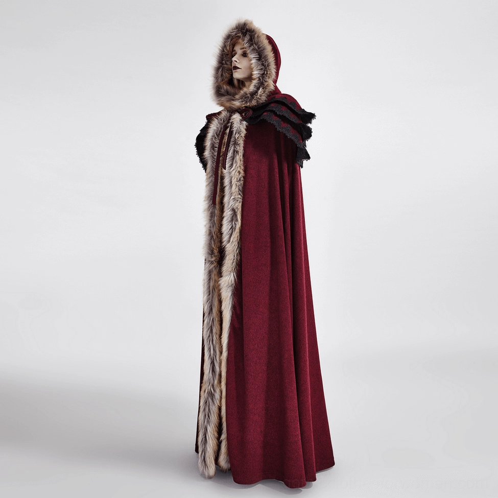 Model wearing wine-red gothic cloak in side profile showing faux fur hood trim and elegant draping detail