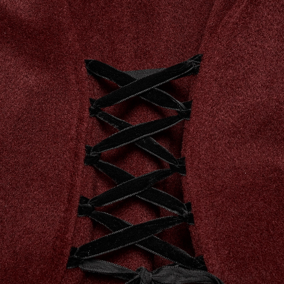 Close-up of adjustable rope waist feature and waistband construction detail showing gothic coat tailoring and fit adjustment mechanism