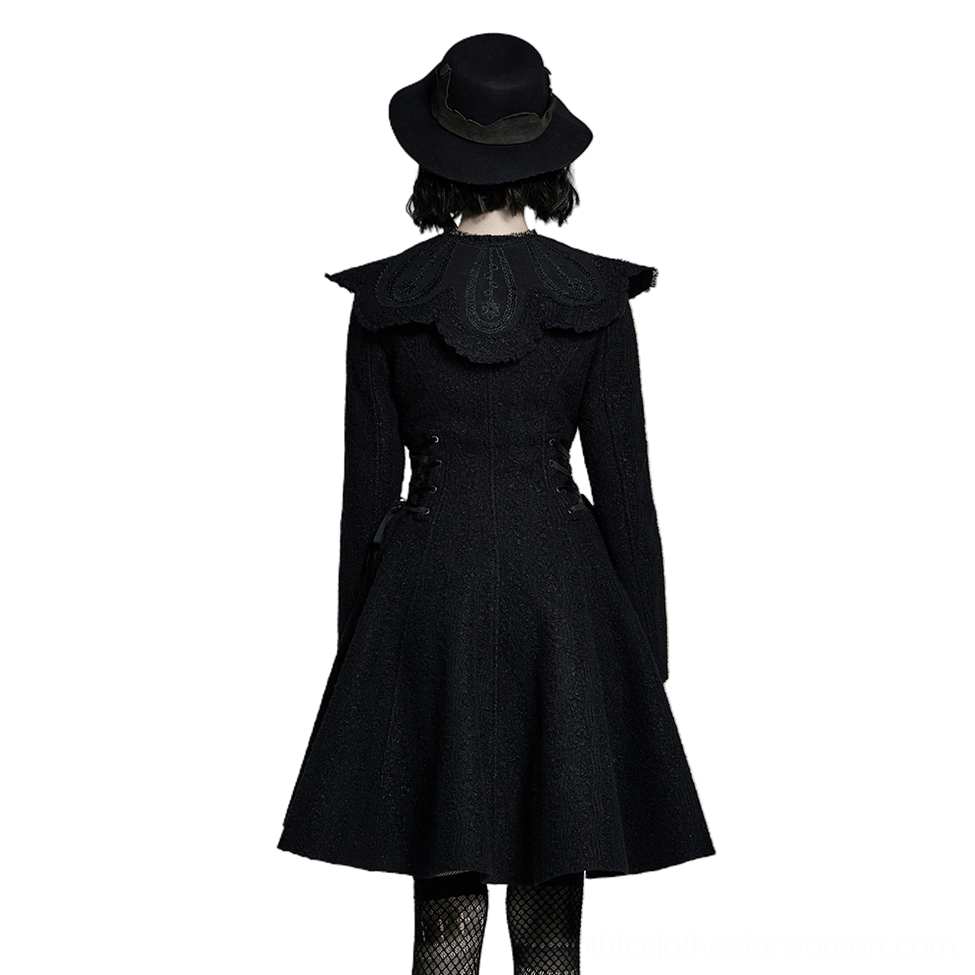 Black Victorian gothic winter coat back view showing fitted waist and flared hem