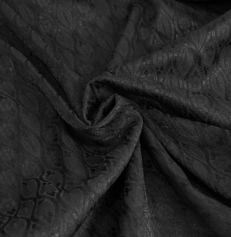Detail view of gothic coat lapel beading and decorative embellishment close-up