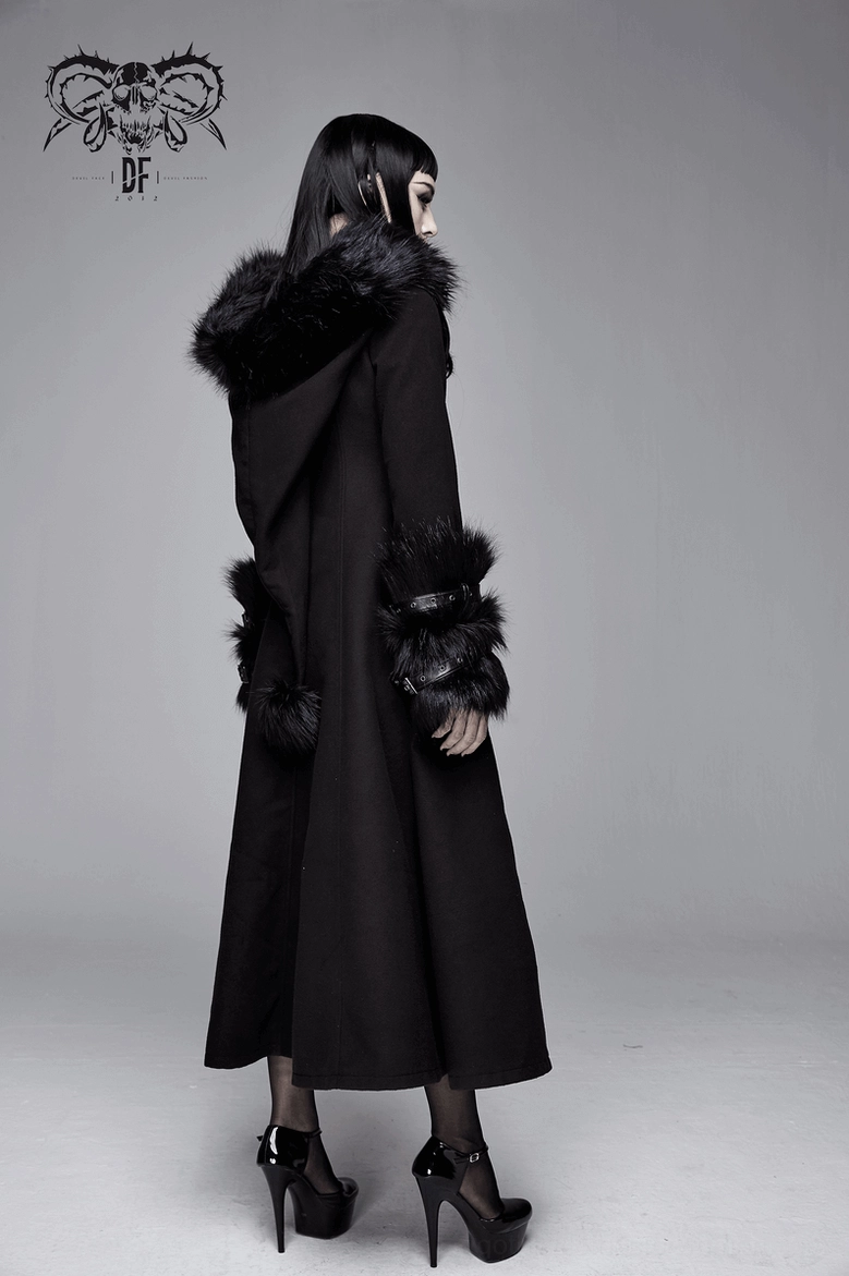 Detail photograph of gothic coat buckle cuff system, leather strap construction, metal hardware, and faux fur trim coordination