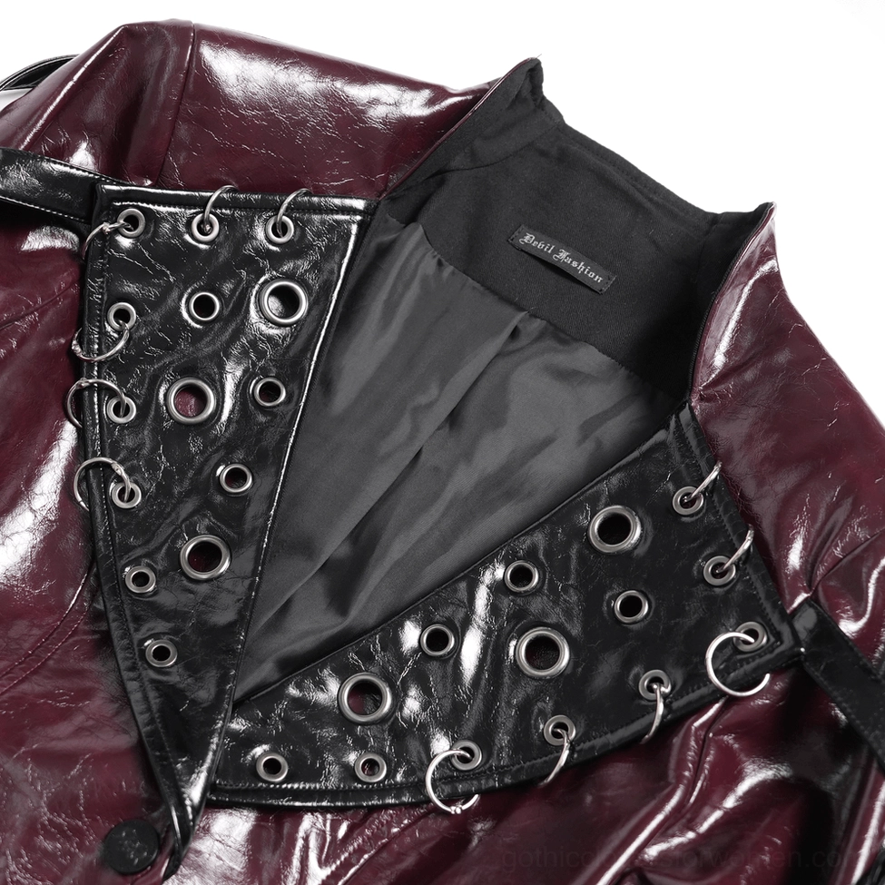 Close-up detail of burgundy gothic coat collar showing metal grommets, D-ring hardware, and patent leather finish