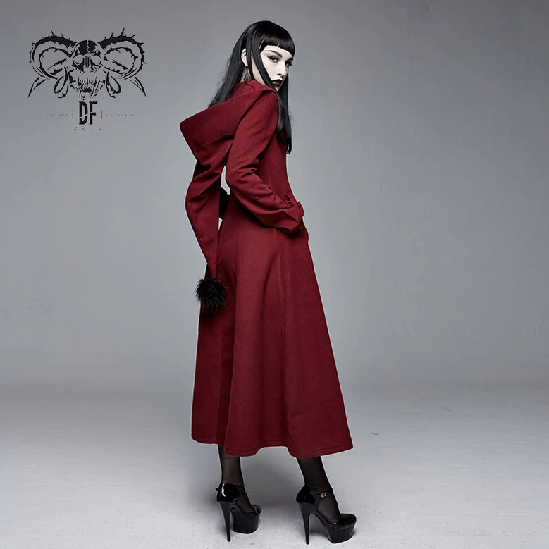 Detailed view of burgundy gothic coat showing cuff buckle system and sleeve opening design