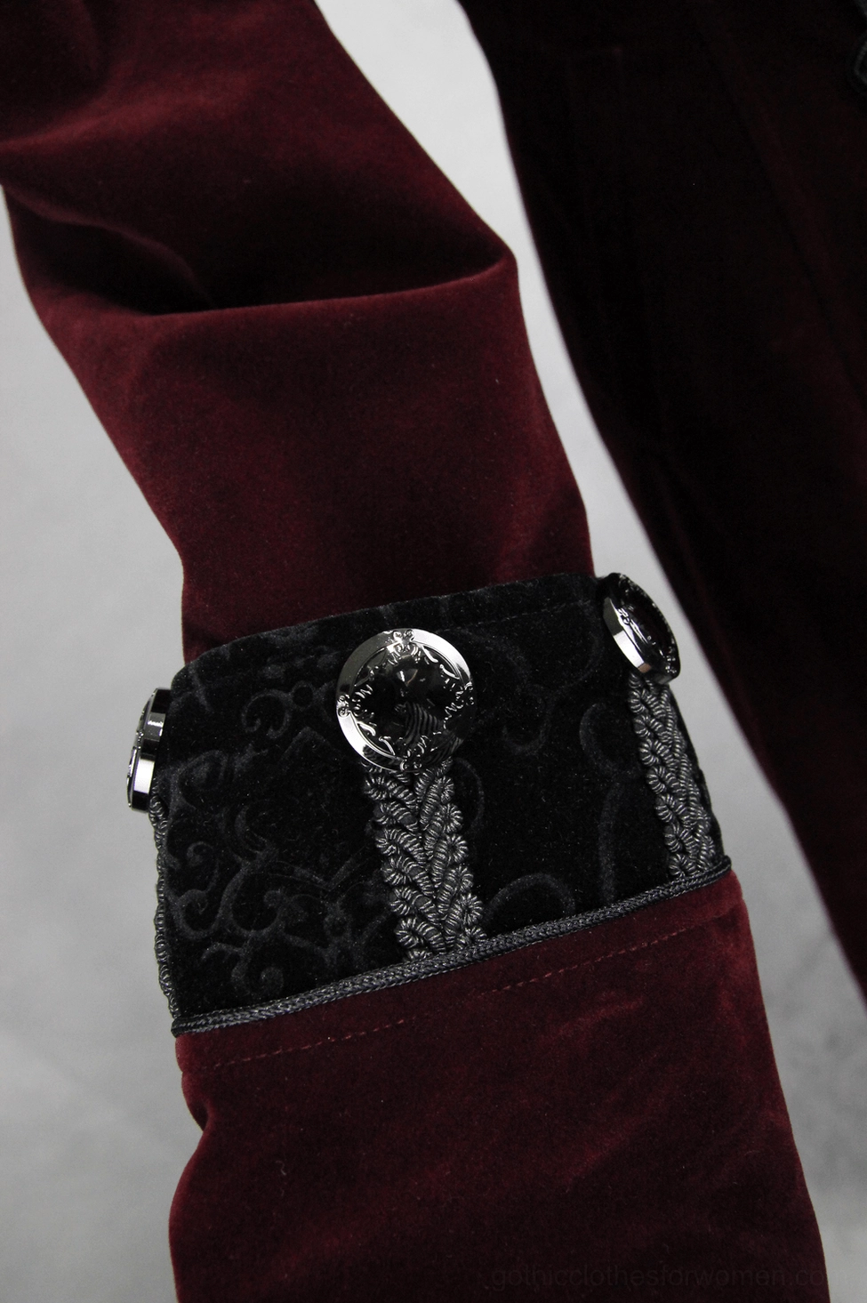 Gothic coat sleeve cuff close-up - tailored velvet cuff with two decorative gem buttons and embroidered velvet trim details