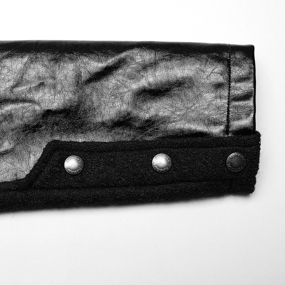Close-up detail of PU leather cuff flap with silver metal snap buttons on gothic coat sleeve
