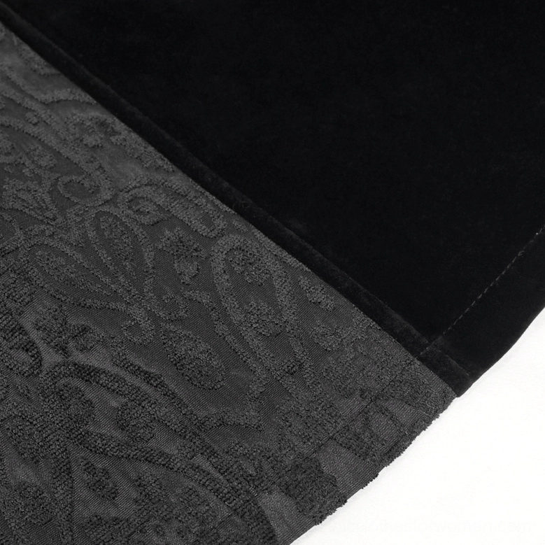 Gothic black coat fabric texture close-up, showing damask jacquard weave mixed with velvet trim embellishment