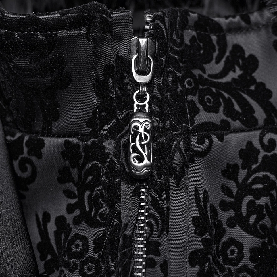 Close-up of black damask jacquard pattern and decorative gemstone buttons on gothic coat front