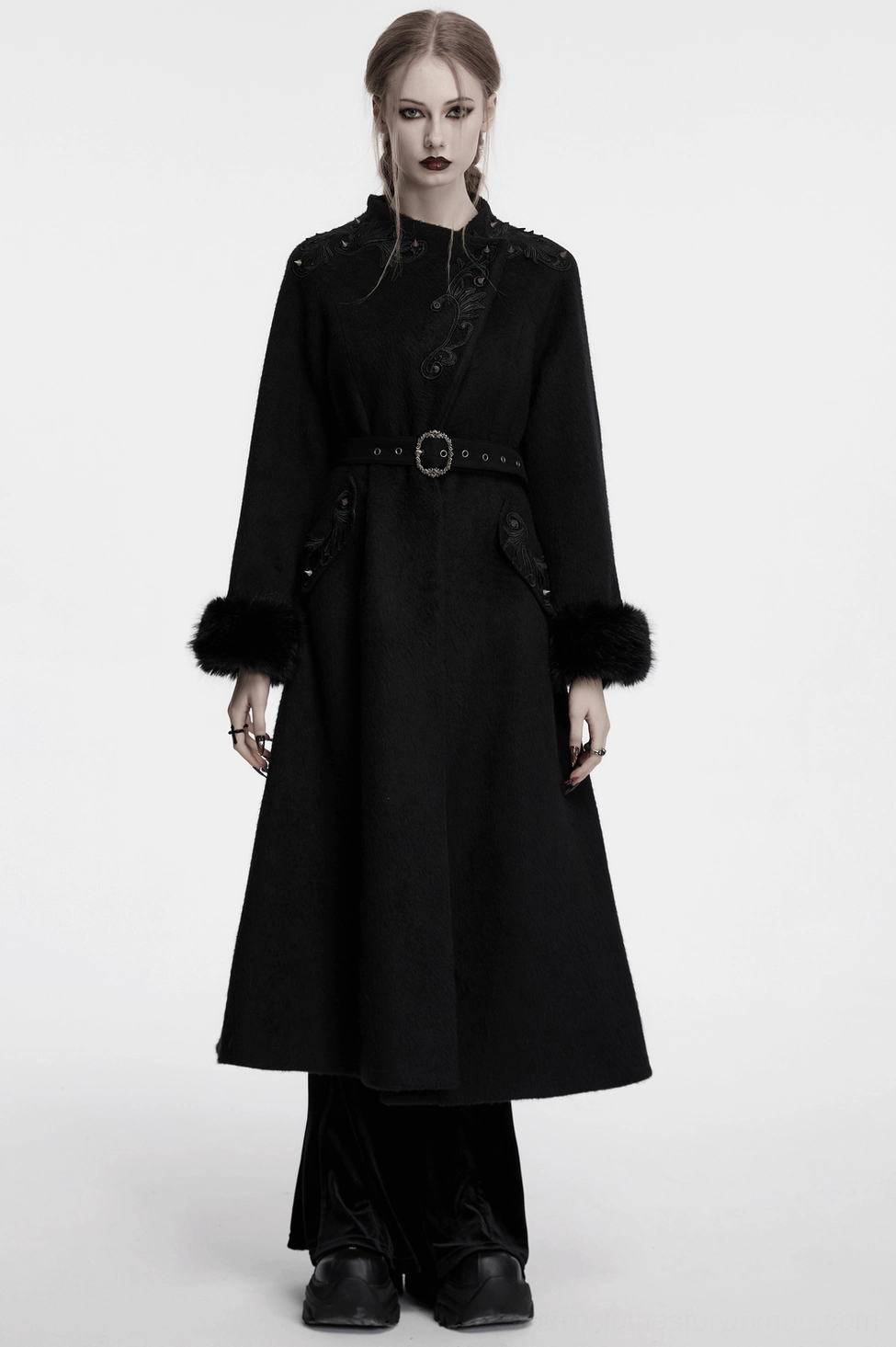 Detachable fur cuff detail on black gothic coat, demonstrating luxury plush texture and versatile wear options