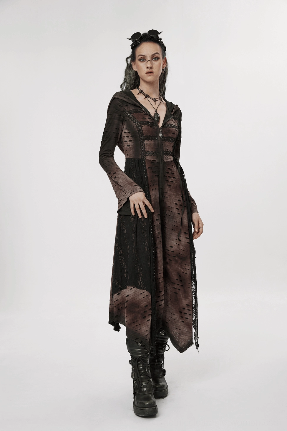 Gothic winter coat detail view showcasing distressed fabric finish, lace mesh panels, and irregular hem construction