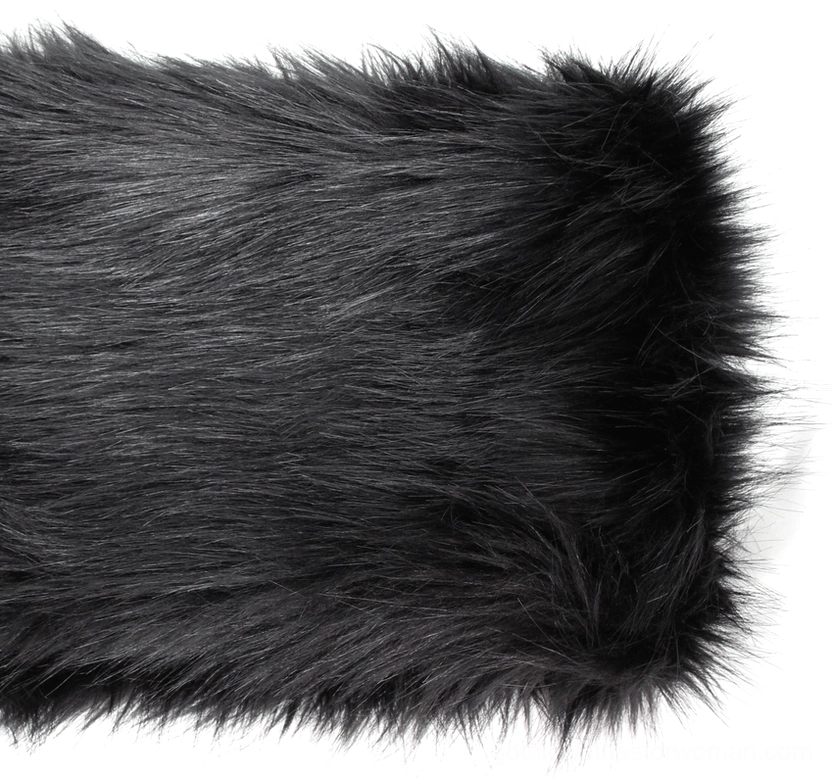 Close-up of black faux fur texture and material detail on gothic coat showing soft fluffy pile