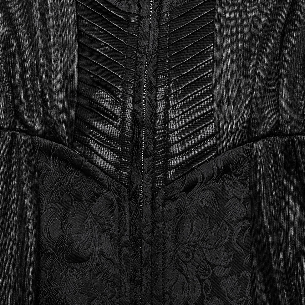 Close-up detail of gothic coat front zip closure featuring vertical knife pleats and textured floral jacquard weave